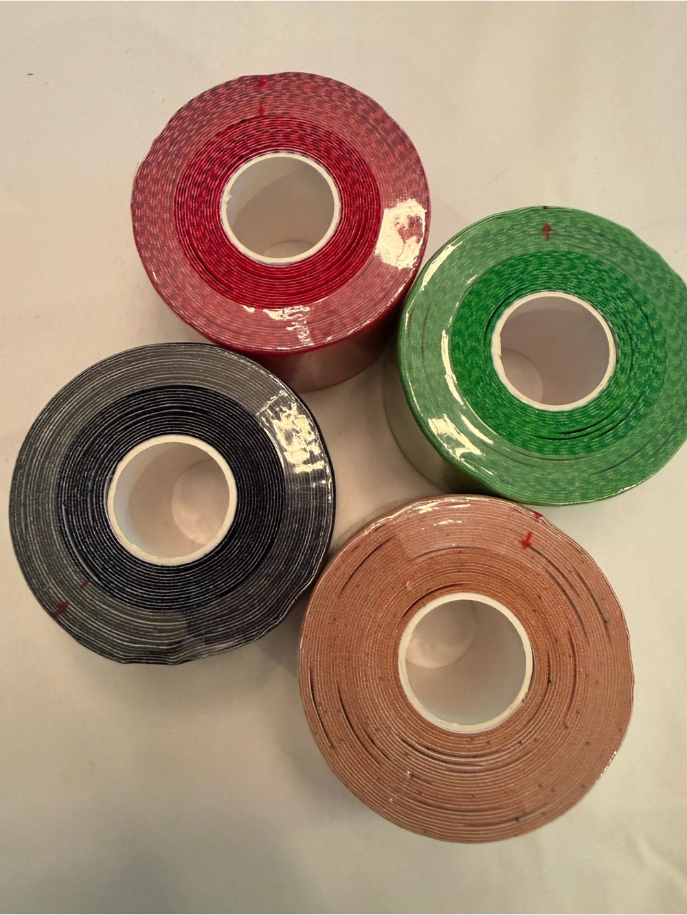 Assorted Colored kinesiology sports Tape Rolls – Red, Green, Black, Tan, precut
